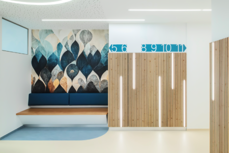 doctor's office with wooden walls and blue wallpaper